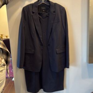 Banana Republic size 14/16 3 pair suit. Brand new with tags.